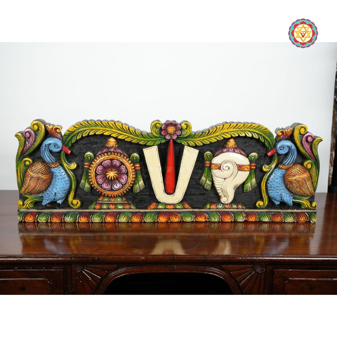 Side close-up of carved wooden Balaji panel