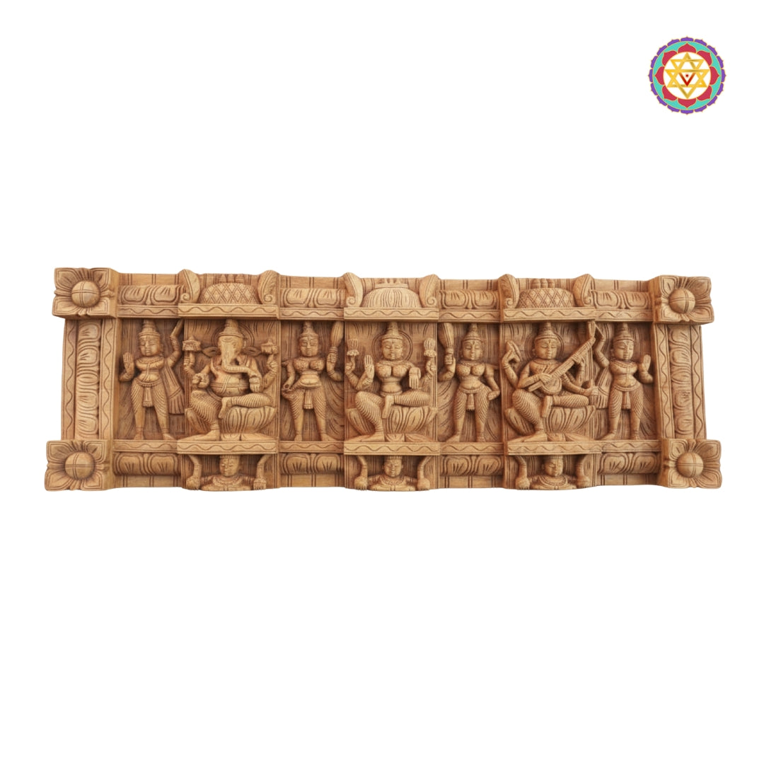 Temple style vintage wood artwork showing Ganesha Lakshmi Saraswati with devotees