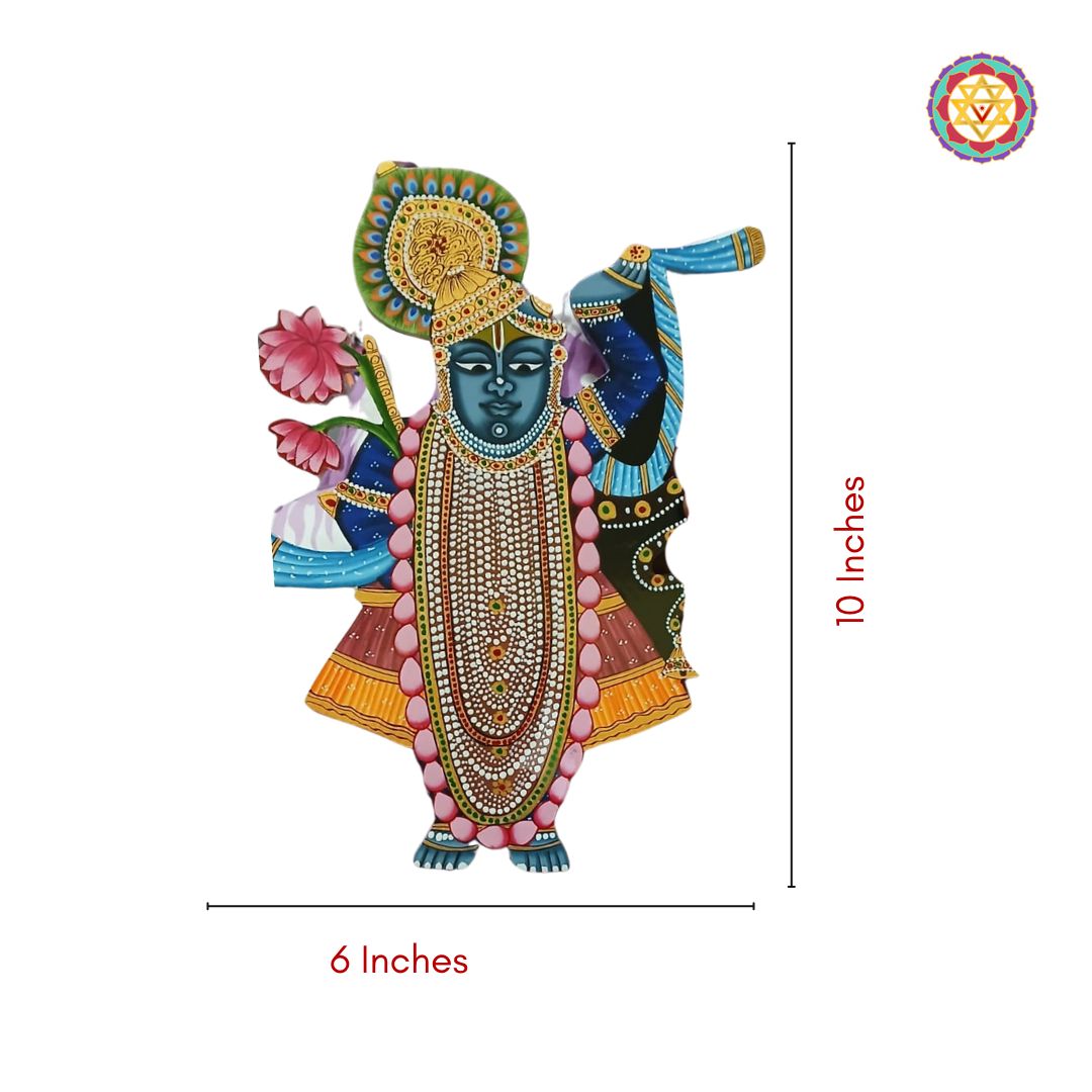 Close-up of detailed Shrinathji cutout with traditional colors and lotus motif.