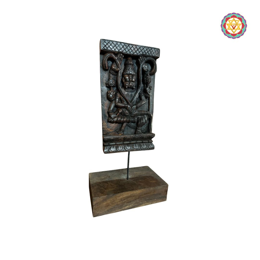 Side-angle view of Yali Kirthimukha Narasimha tabletop carving