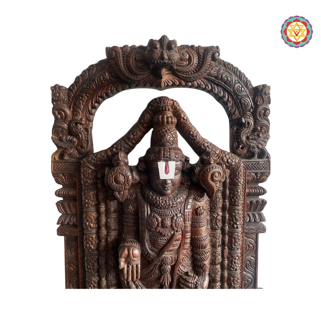 wood carved balaji sculpture closeup intricate handwork