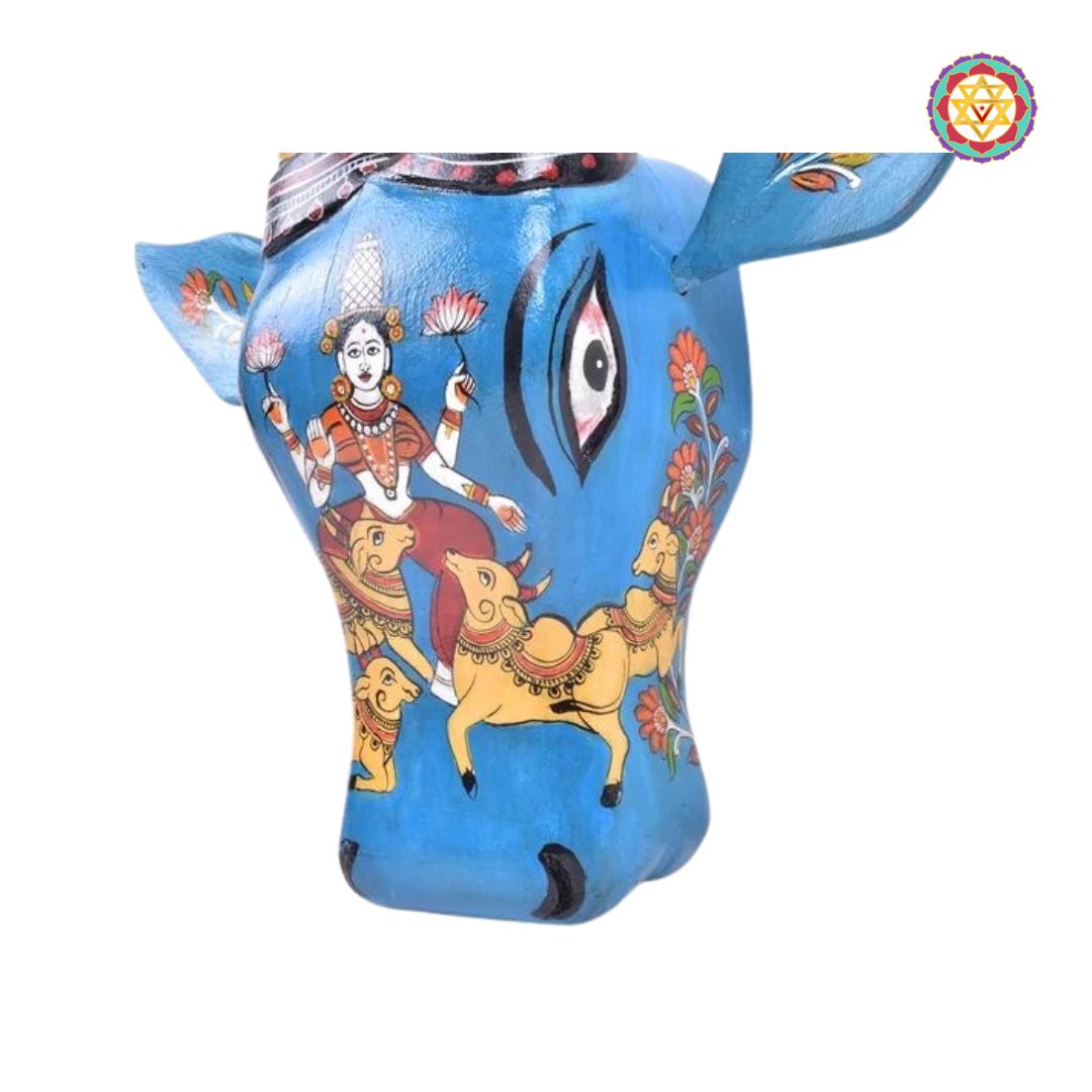 Wood carved ,hand painted decorative wall mountable cow heads /Nandi head . Goddess Laxmi .