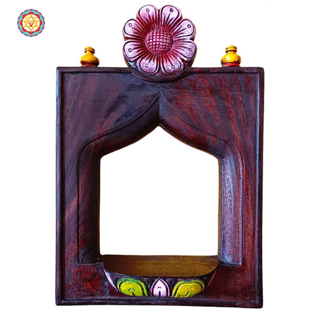 Handcarved wooden frame — traditional Indian art for home display.