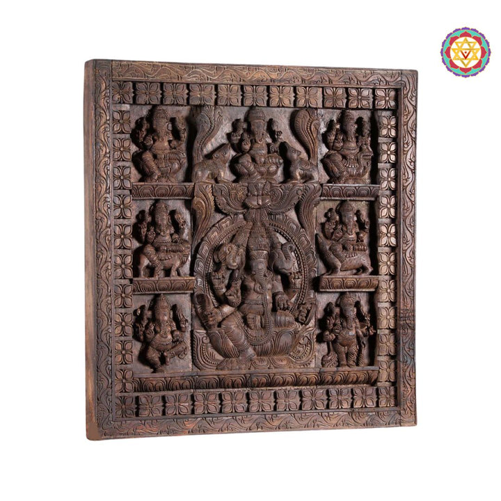 Angled view of the square wooden panel with deity carvings