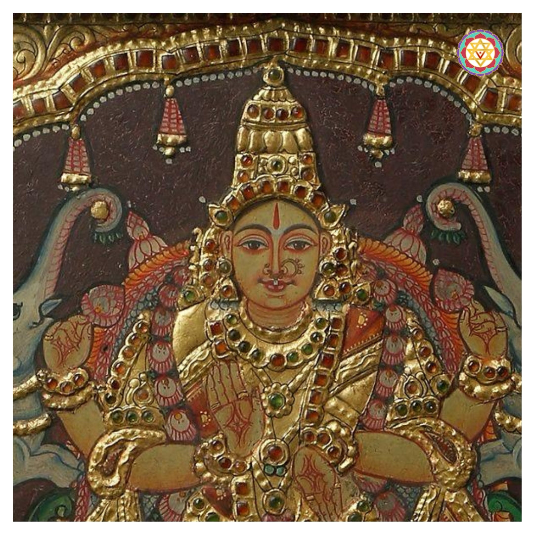 Detailed view of Gajalakshmi Devi with elephants and golden halo
