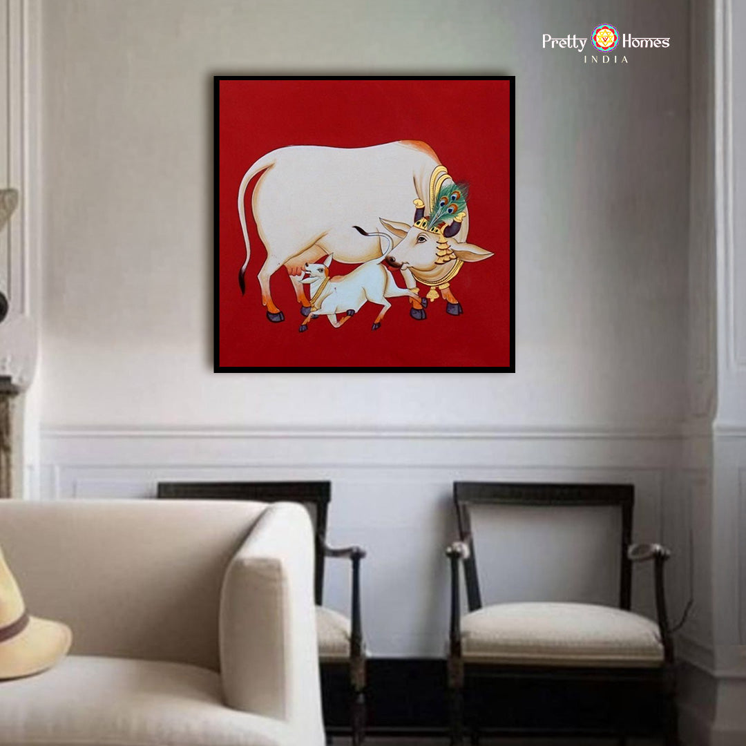 Closeup detailing of red Pichwai cow and calf painting