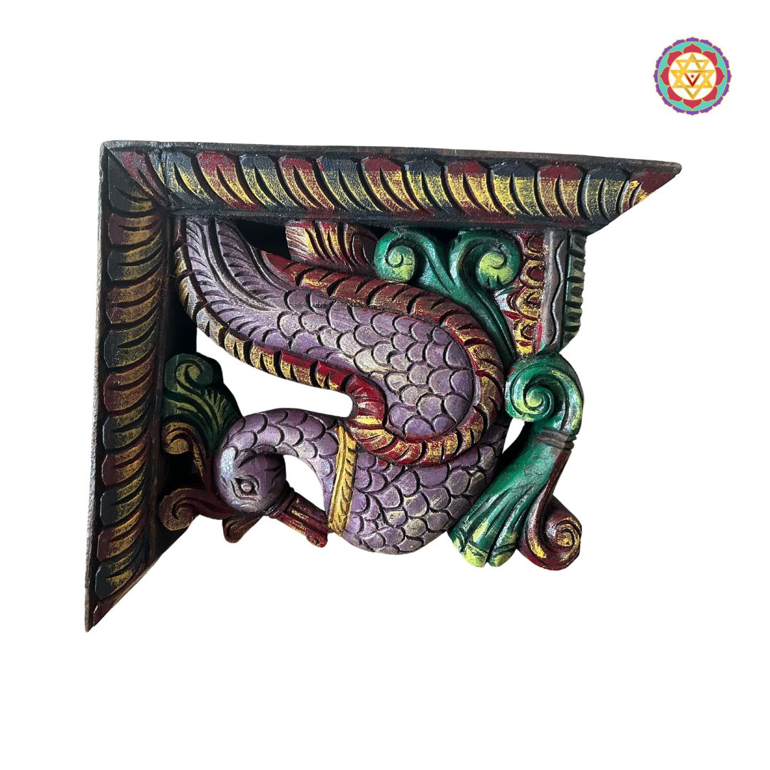 close up of wooden annam swan bracket showing intricate feather and vine carving