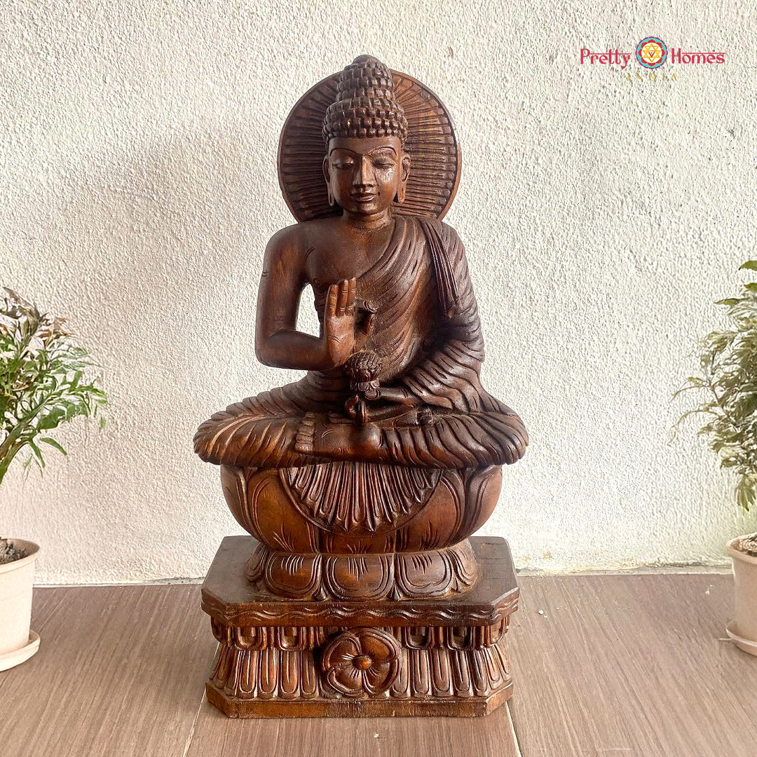 woodcarved buddha statue in abhaya mudra peaceful wooden sculpture