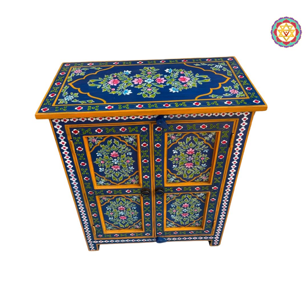 ornate handcrafted floral panels on wooden cabinet