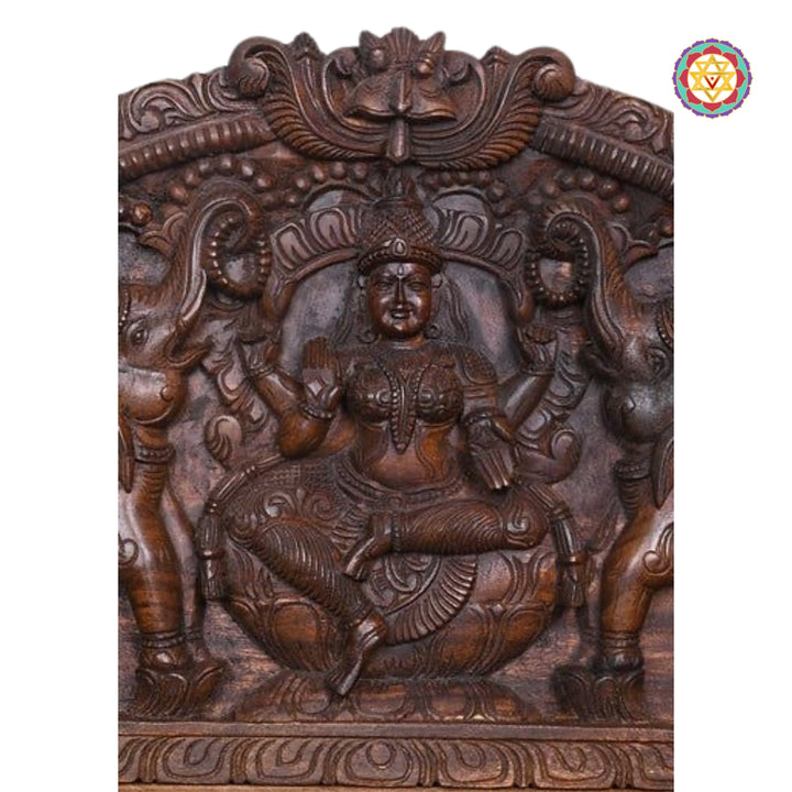 Hand-carved Lakshmi panel in traditional South Indian style