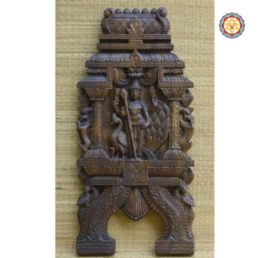 Wooden carved wall panel of Lord Murugan with peacock and kavadi frame