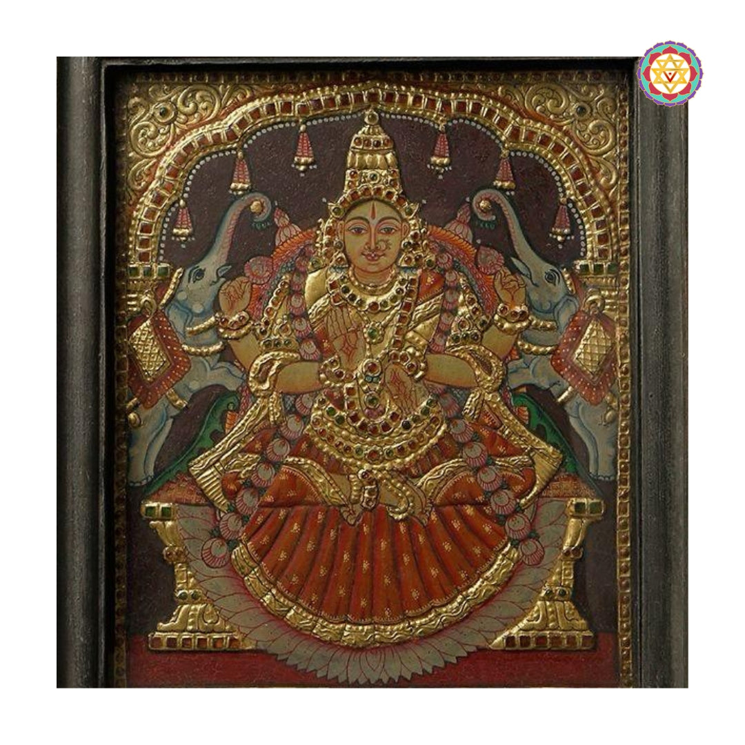 Frontal image of gold foil Gajalakshmi Tanjore painting in deep tones