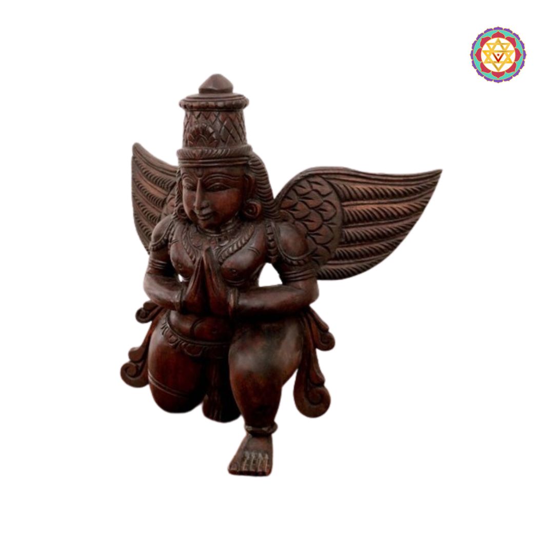 garuda wooden statue close up showing facial features and details