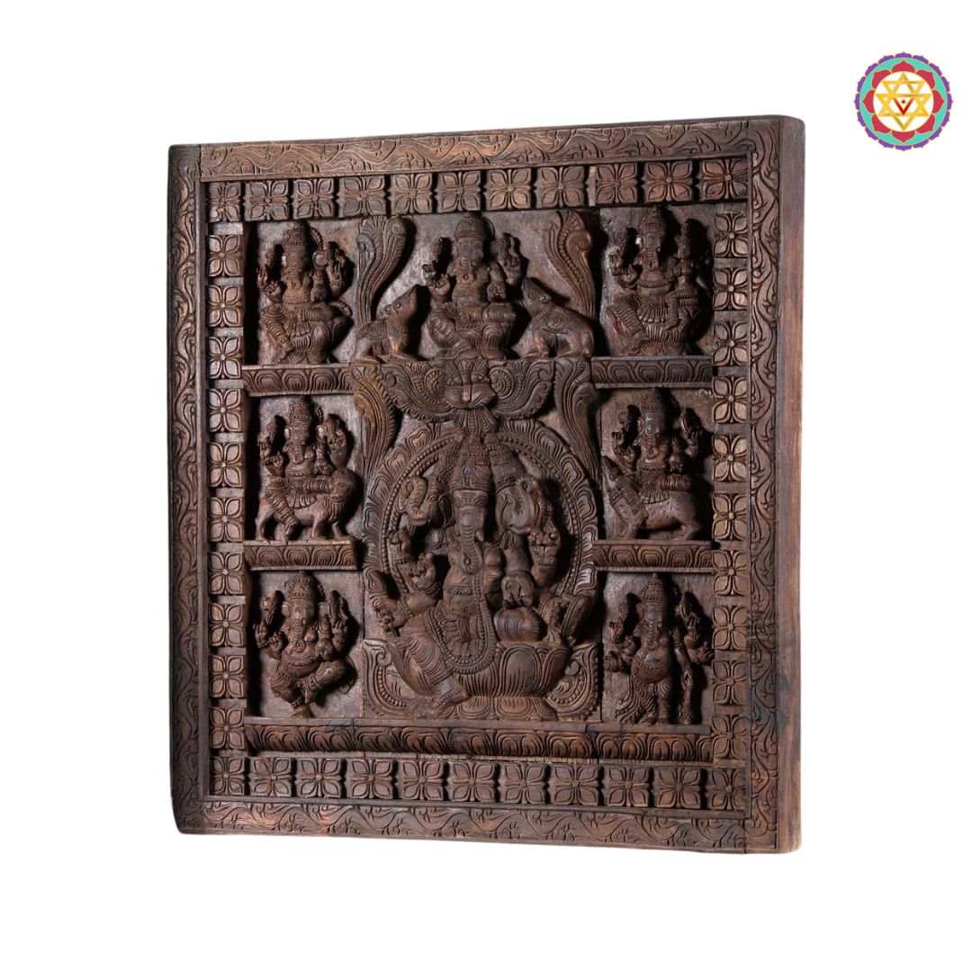 Close-up of central Ganesha figure surrounded by seven others