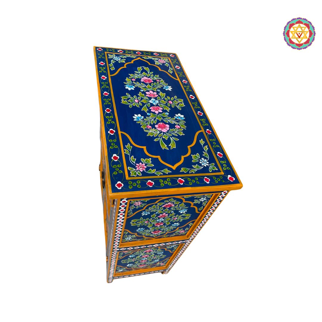 painted wooden cabinet with colourful floral designs