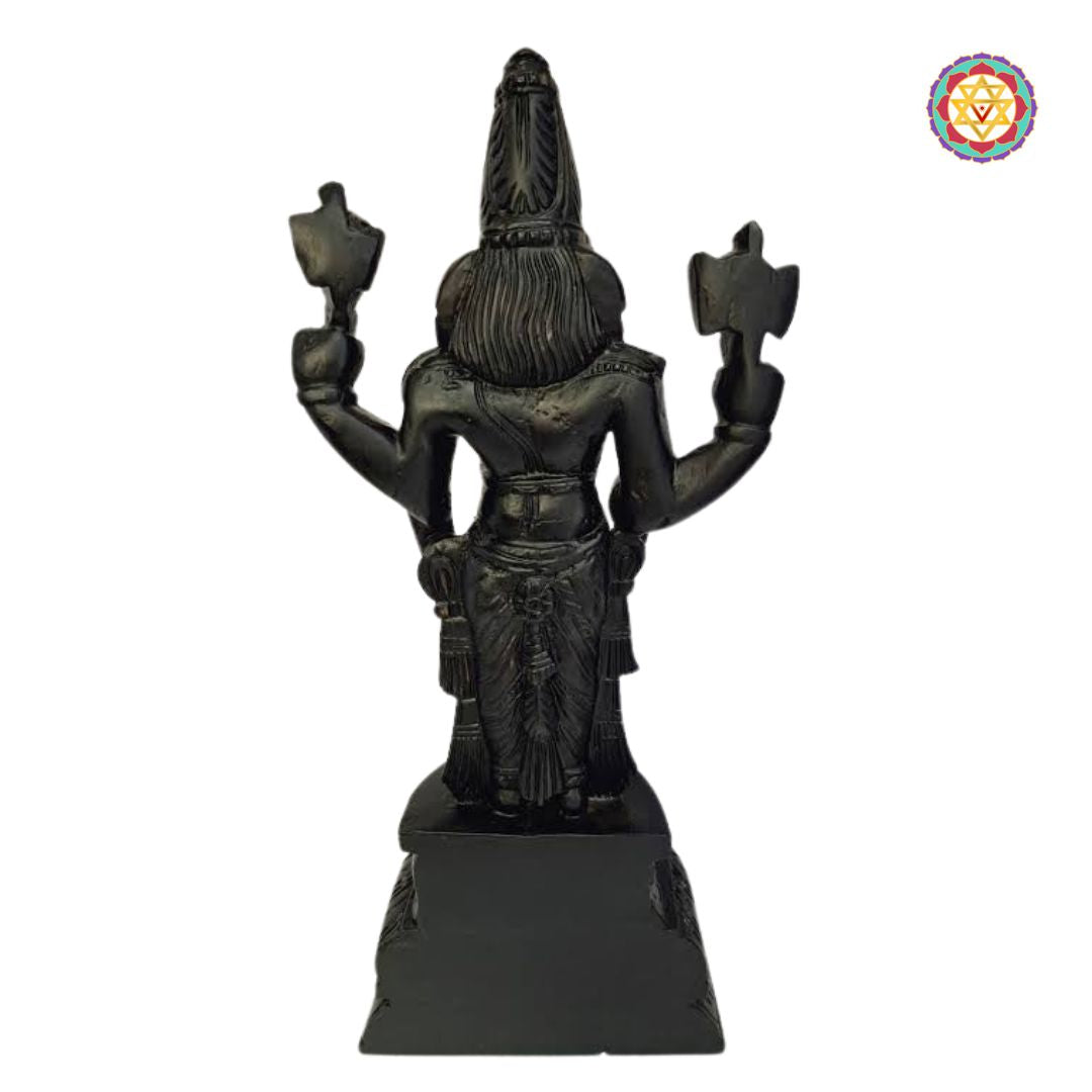 Close-up of Lord Tirupati Balaji face carved in teakwood with antique polish