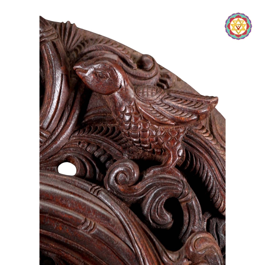 Close-up of Krishna’s face and flute from wooden statue showing divine artistry and polish
