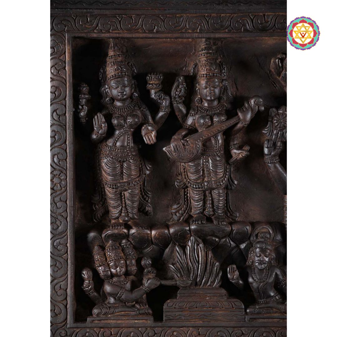 Close-up of Parvati and Vishnu in polished wooden panel