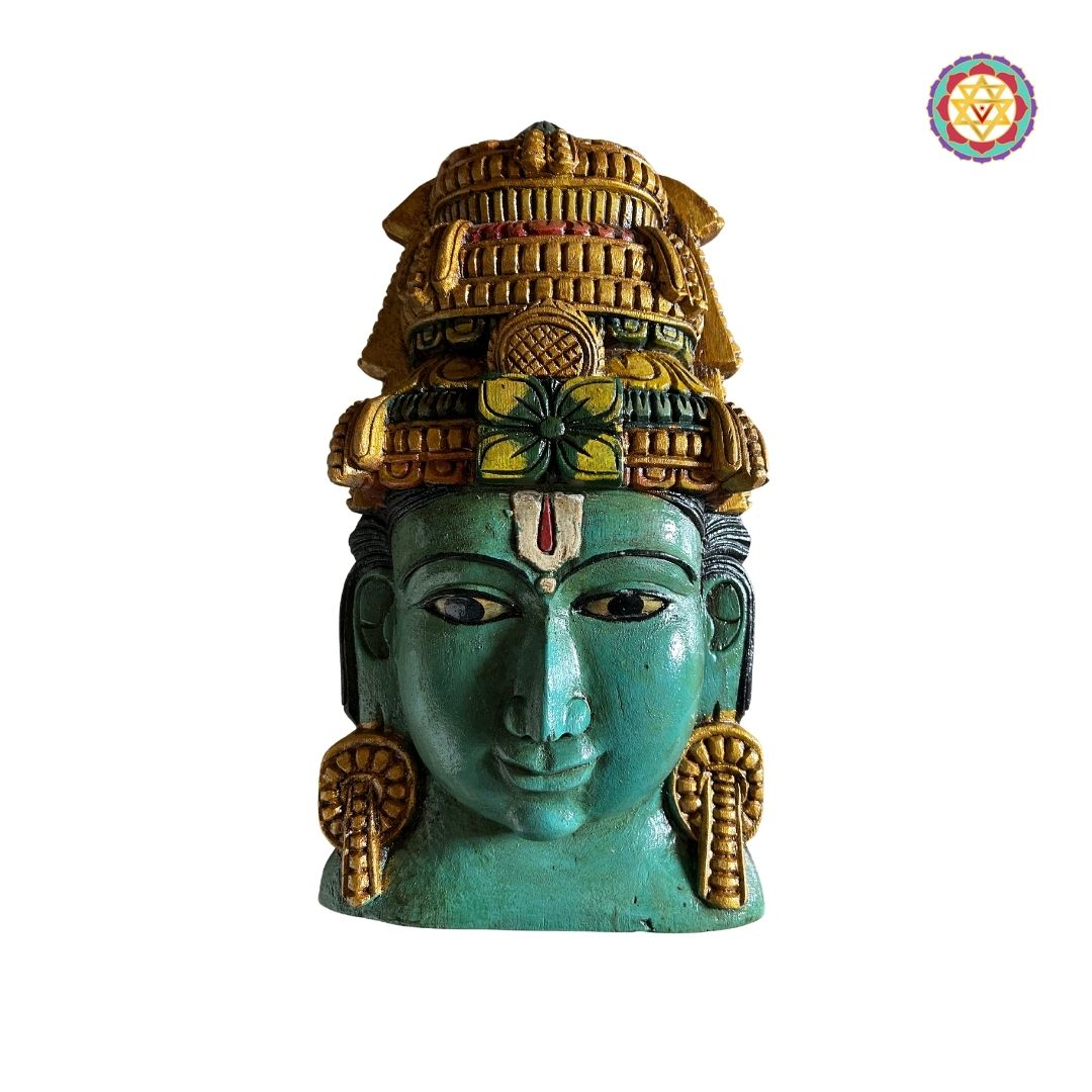 Side view of hand-carved Vishnu wall mask in multicolour finish