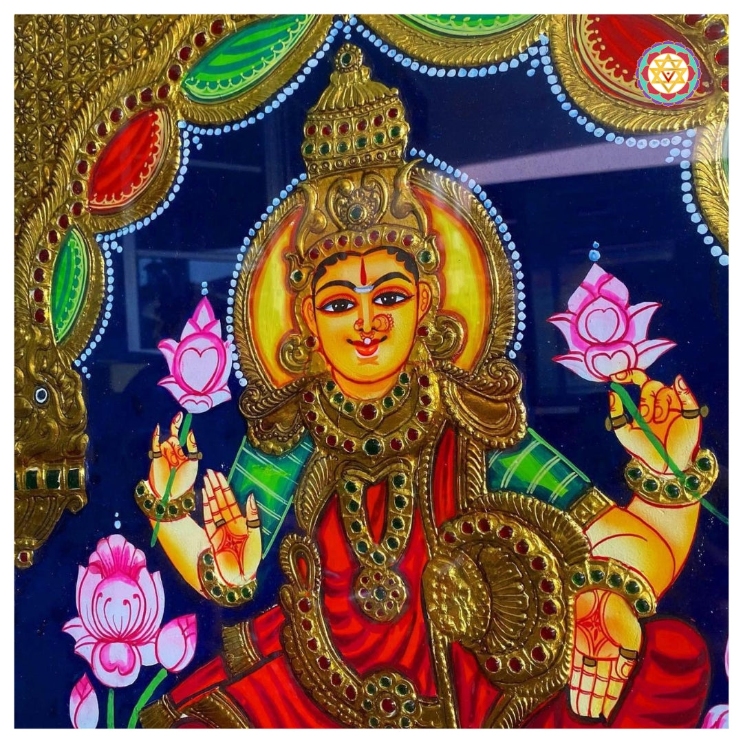 Close-up of Lakshmi with elephants in 22-carat gold Tanjore painting style