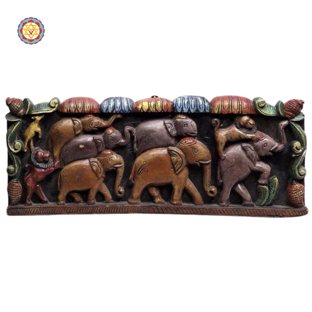 Close-up of elephant carvings with vibrant detailing