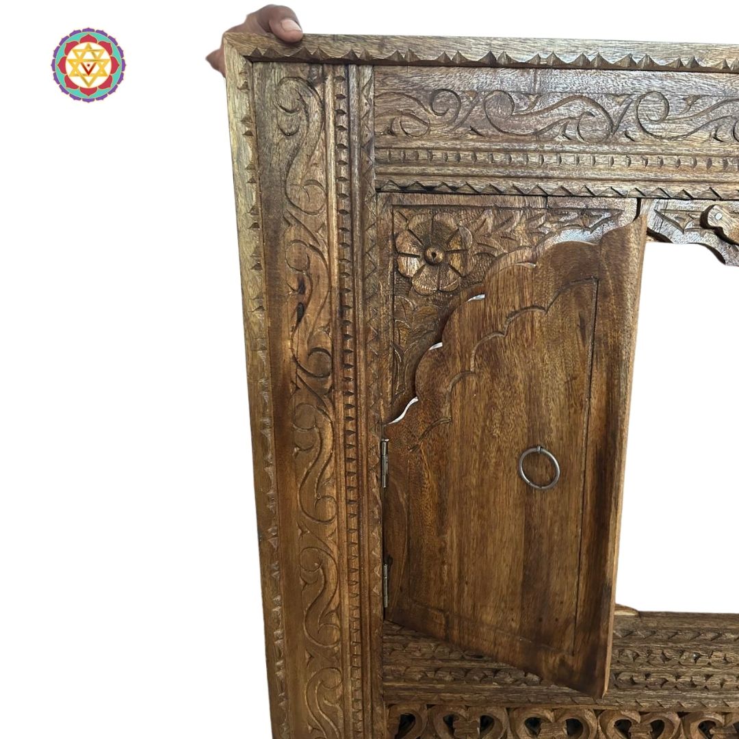 “Close-up of the carved wooden jharokha window frame highlighting intricate details.”