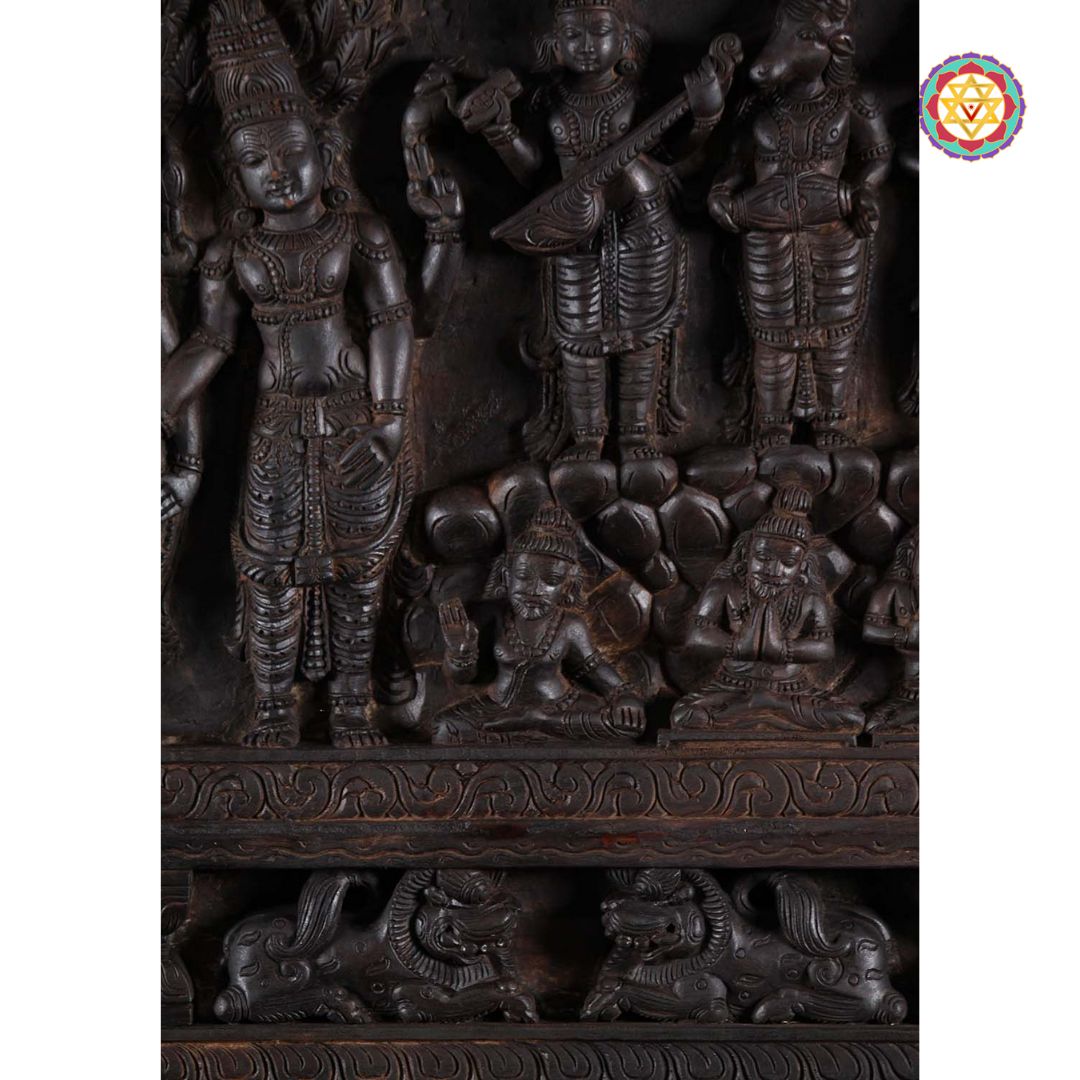 Floral and border detailing on Shiva Parvati wood panel