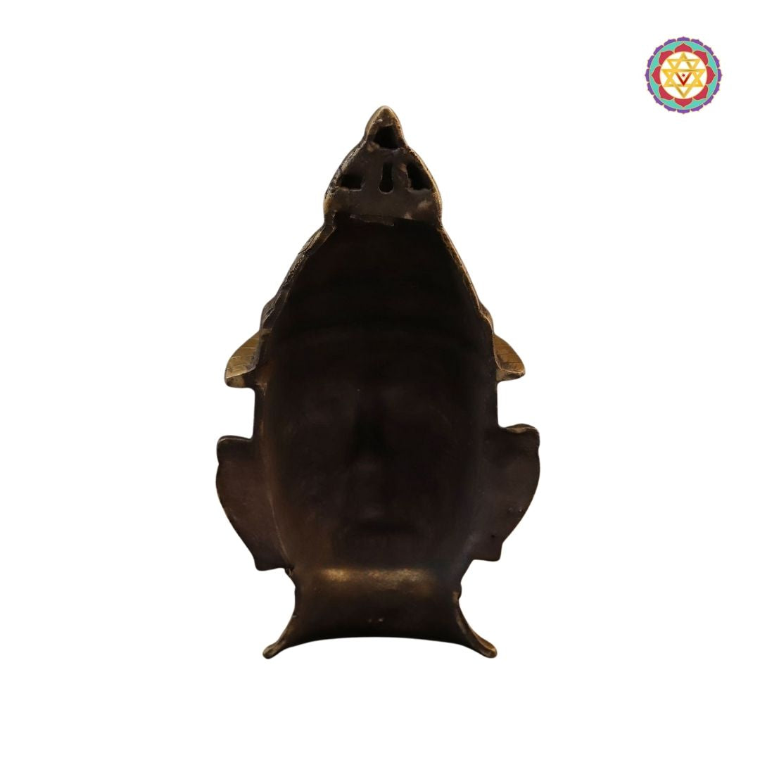 three-quarter view of Parvati bust emphasizing carved hair and crown details