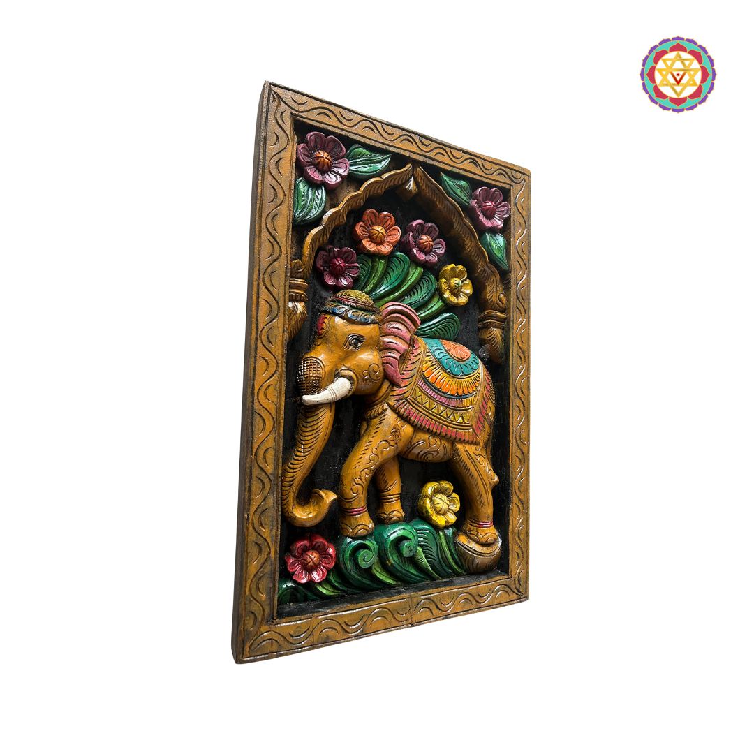 Side view of handcarved elephant and flower wall art