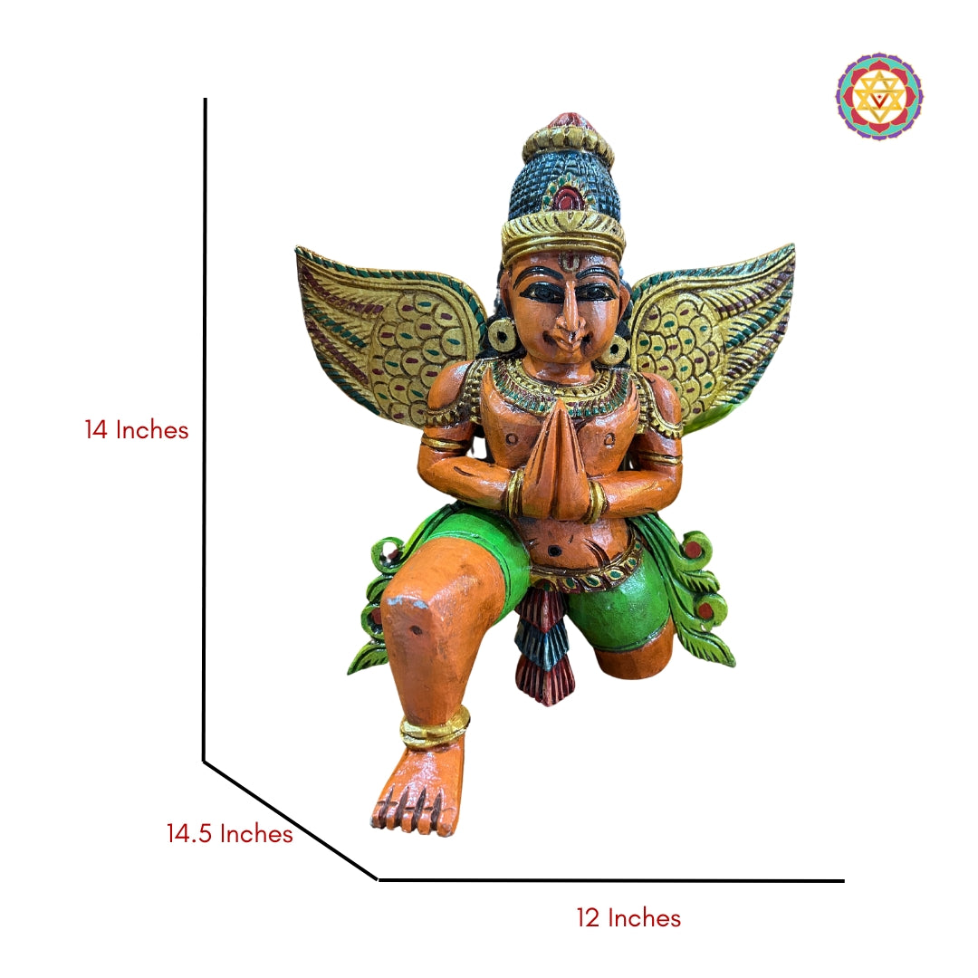Garuda sculpture meditation pose on console setup — Indian wooden deity art for pooja room or living room display