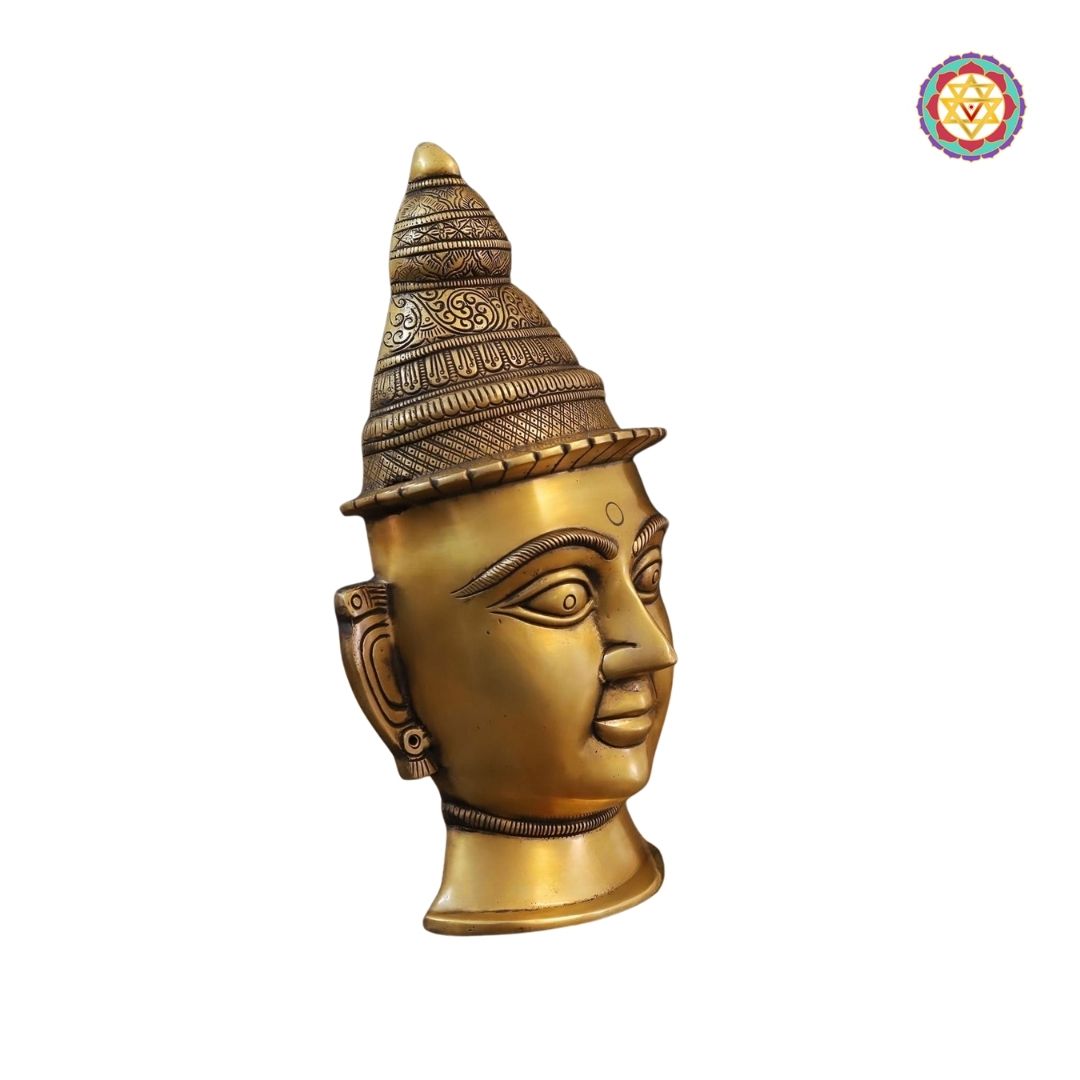 close-up of Parvati face showing delicate features and polished golden highlights