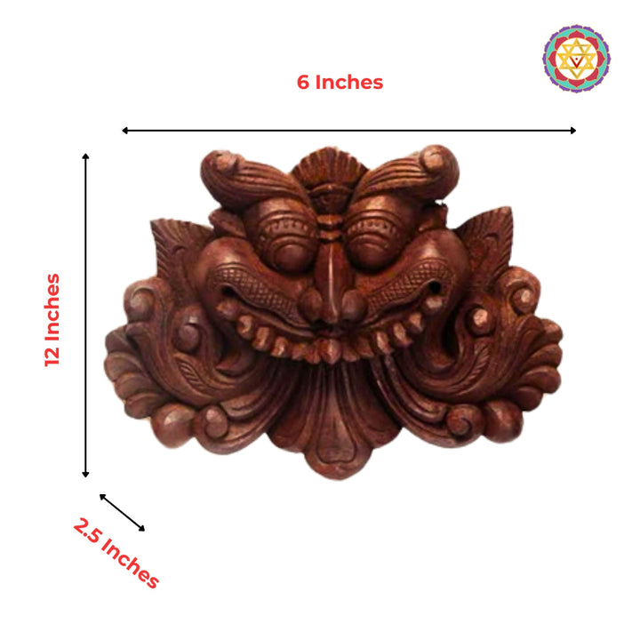 solid wood ornamental carving with floral scrollwork and grotesque face product image.
