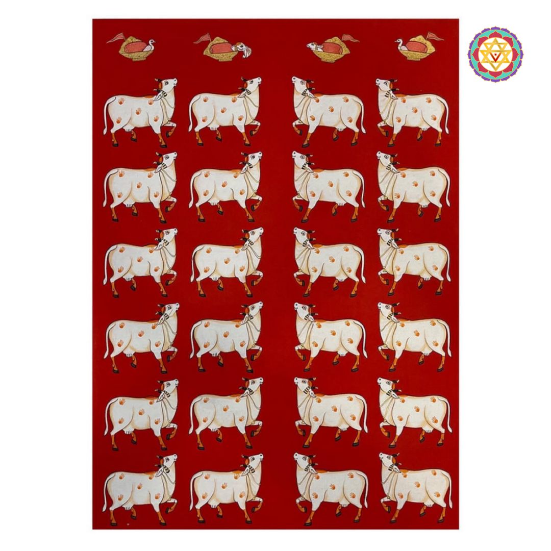 Close-up of pichwai cow artwork on red background with minimal framing.