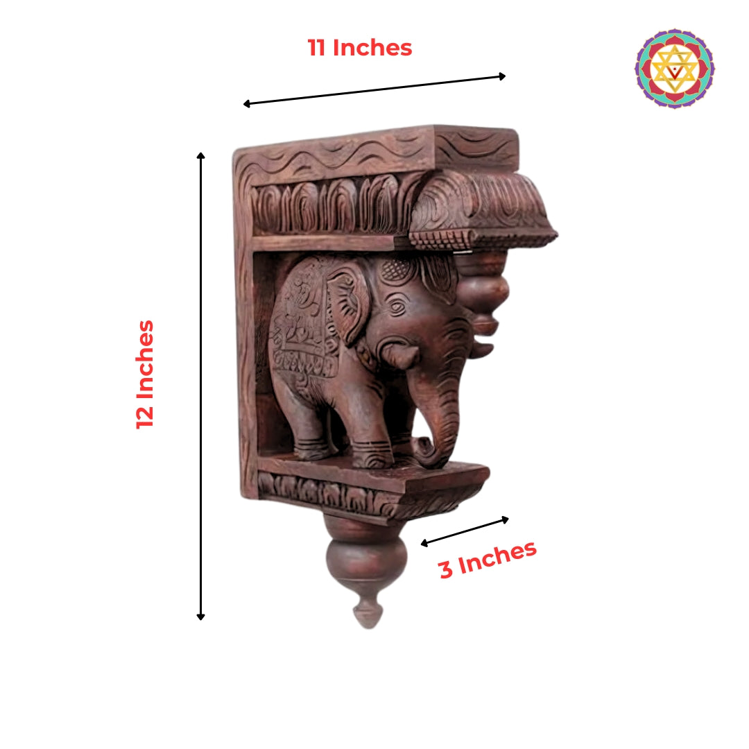 Product diagram showing carved wooden elephant wall bracket dimensions   .