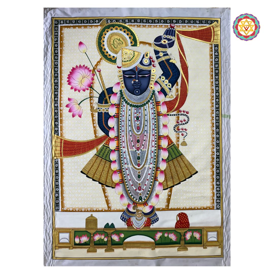 close-up of shrinathji pichwai showing floral border and ornamental patterns