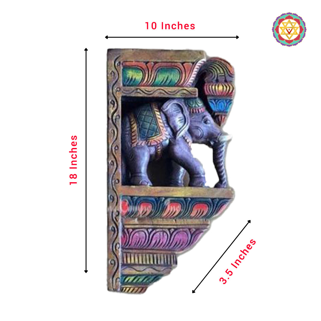 Hand-painted wooden elephant wall corbel in bold folk-art colours.