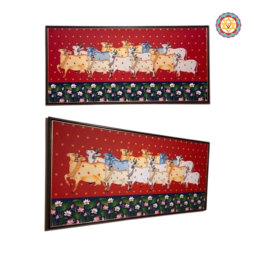 close-up of hand-painted pichwai cow motif with lotus detailing and textured wood base