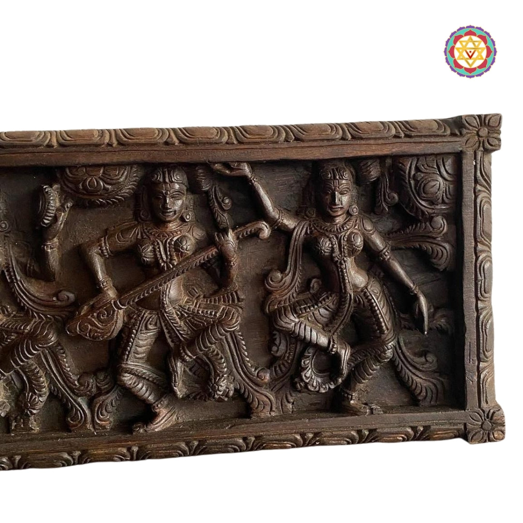 Carved wooden border detail on musical Apsara panel

