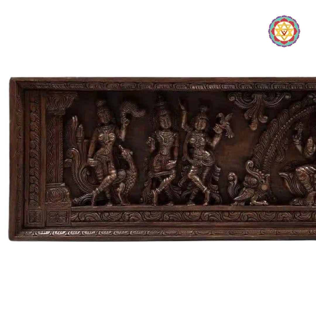 Krishna playing flute carved in wood