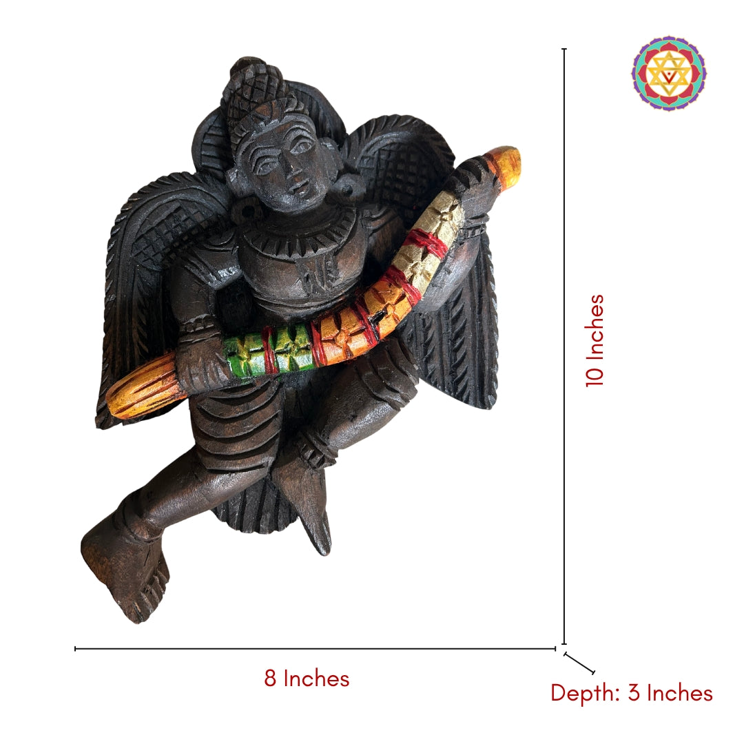 close-up of wood carved celestial gandharva figures