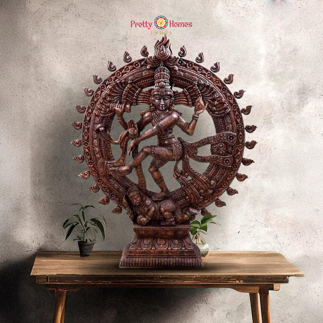 wood-carved nataraja statue depicting lord shiva cosmic dance