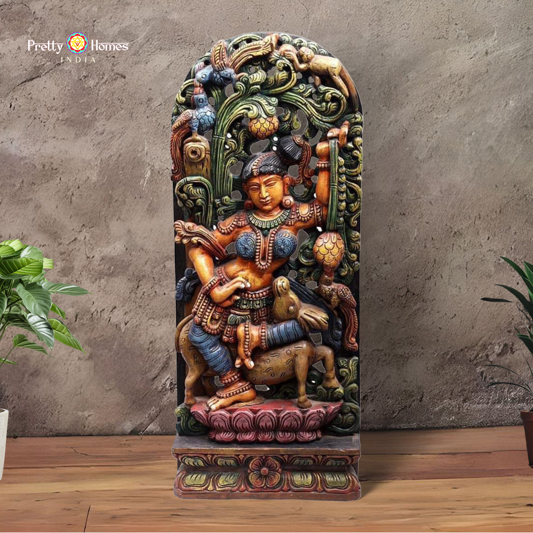 Front view of dancing Apsara wooden statue showing celestial dancer pose and detailed carving