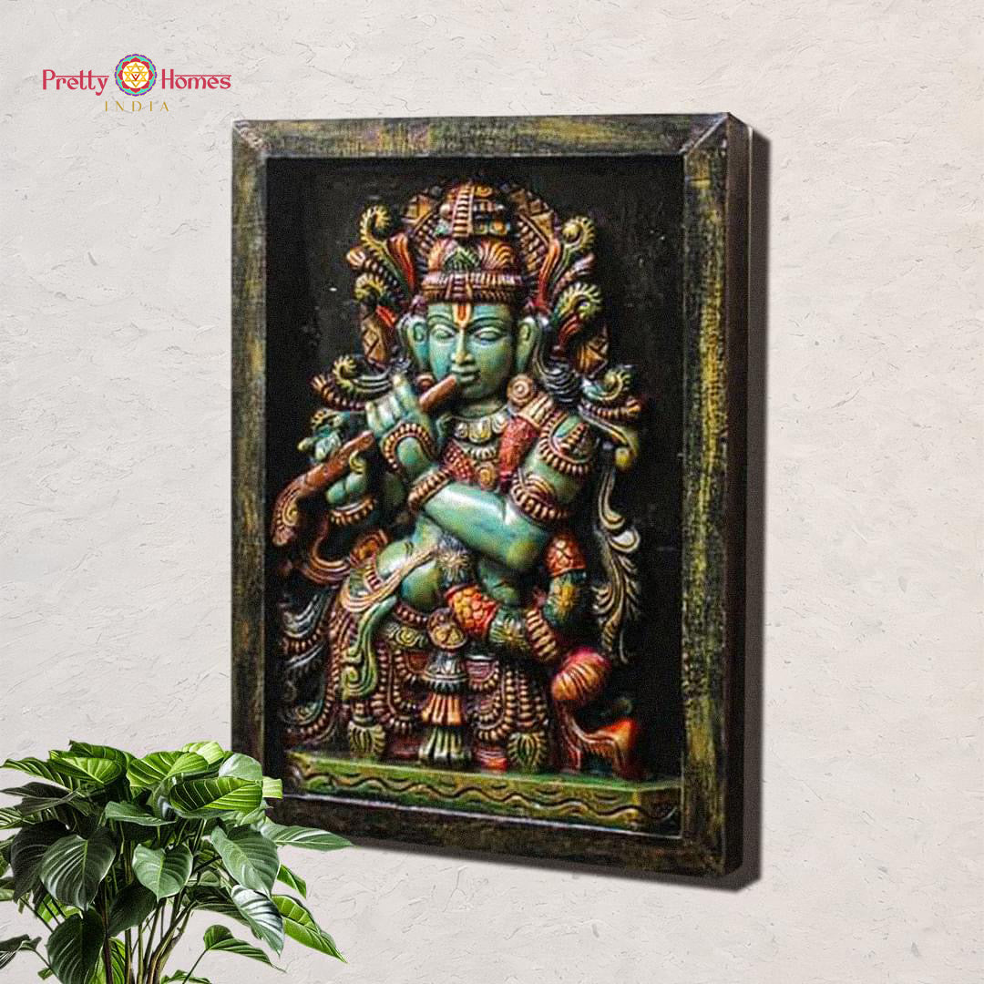 Vintage wooden wall hanging of Krishna in carved frame