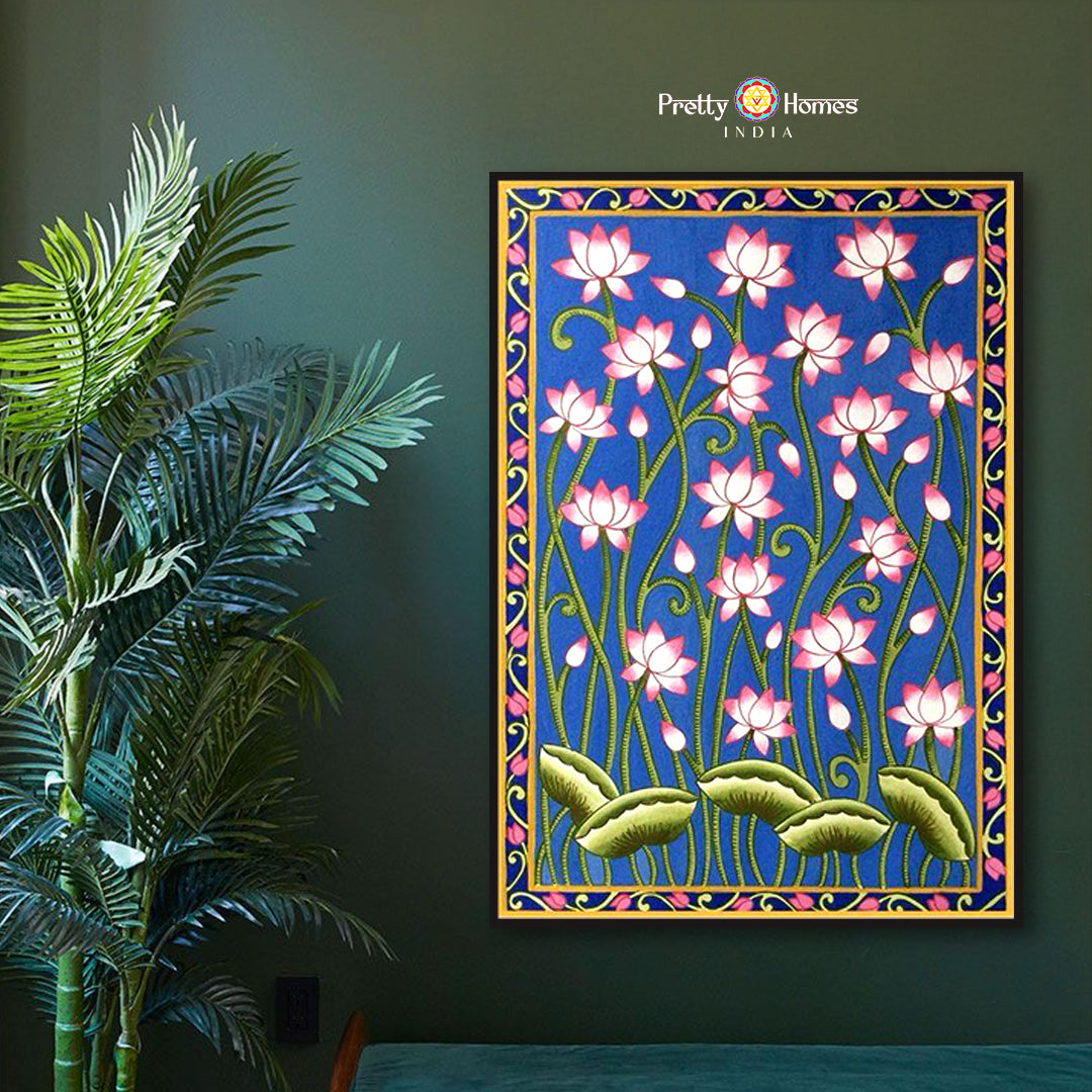 Hand-painted pichwai of blooming pink lotuses in a kamal talai (lotus pond), displayed in a tranquil room setting.
