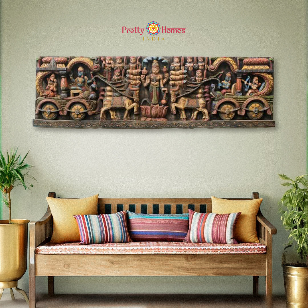 Horizontal wooden wall panel depicting Krishna and Arjuna on chariot from the Bhagavad Gita