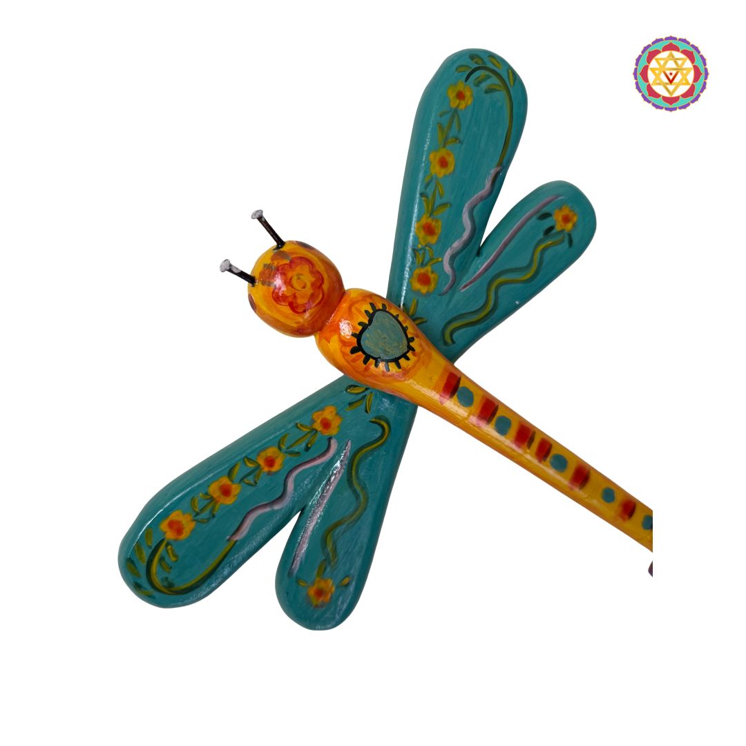 pair of wooden butterflies displayed together