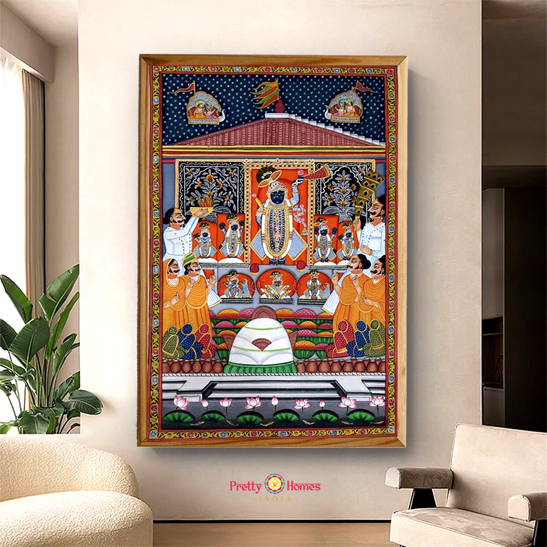 Traditional Indian painting of Krishna surrounded by peacocks and gopis