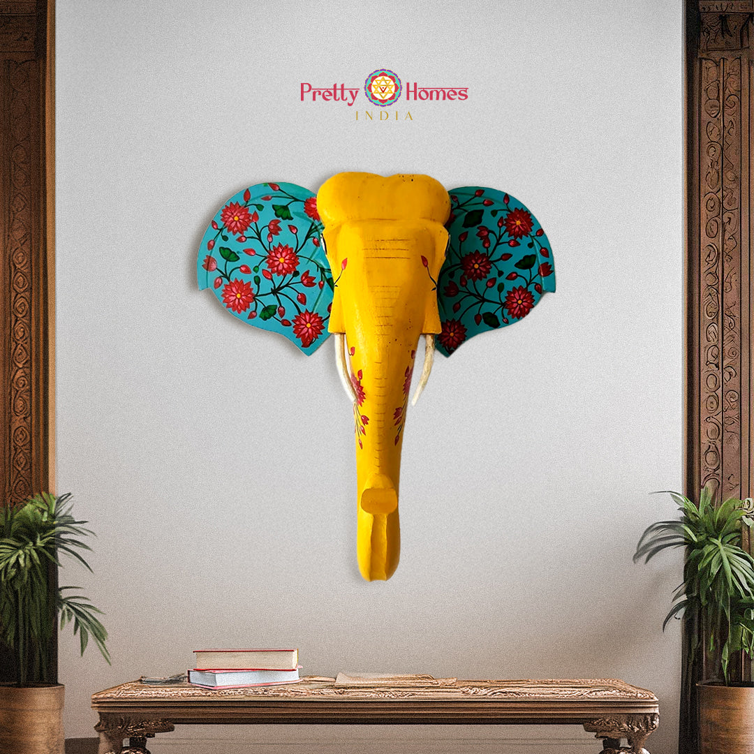 Traditional wooden elephant head wall hanging hand-painted in multicolour tones