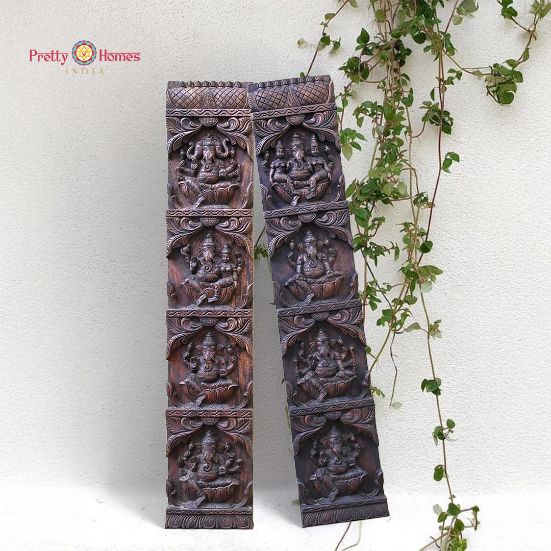 Pair of decorative wall panels with carvings on a white background with a vine. Vertical wooden wall panel pair featuring Astaganesh carvings