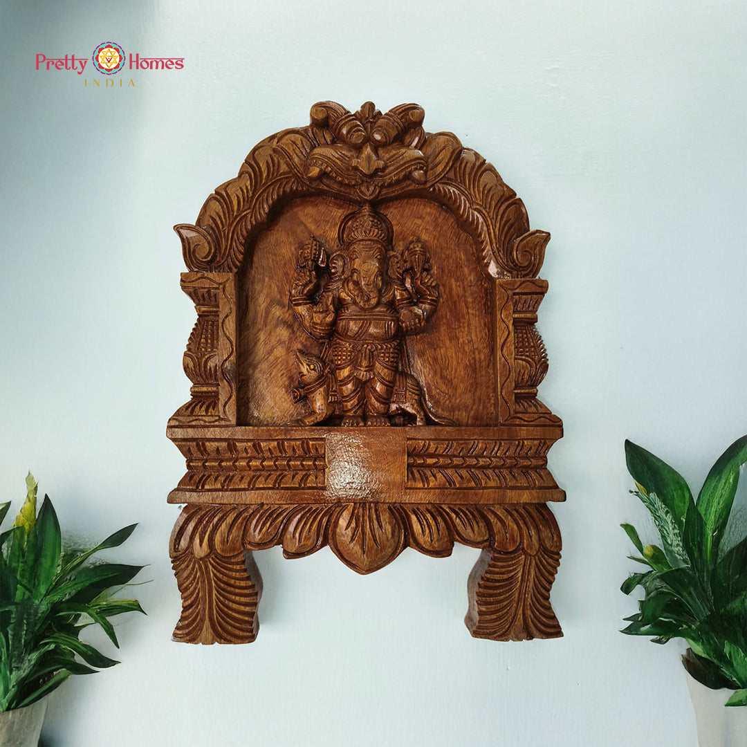 woodcarved lord ganesha frame with mouse and lotus carvings